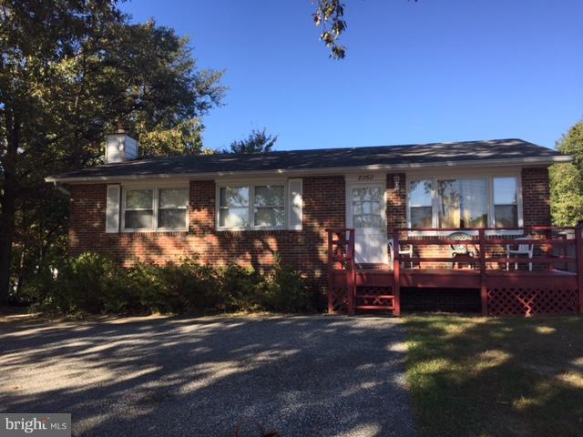 8262 WB&A Road Severn, MD 21144 - Photo 2 of 22 a front view of a house with a yard