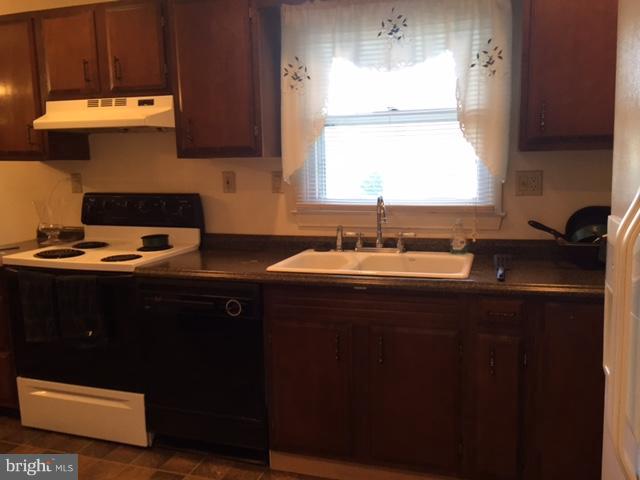 8262 WB&A Road Severn, MD 21144 - Photo 4 of 22 a kitchen with a sink and a window