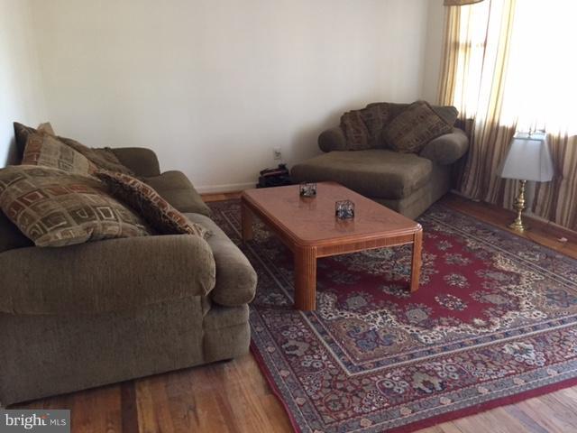 8262 WB&A Road Severn, MD 21144 - Photo 6 of 22 a living room with furniture and a rug