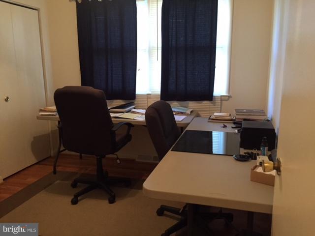 8262 WB&A Road Severn, MD 21144 - Photo 9 of 22 a view of a workspace with furniture and a window