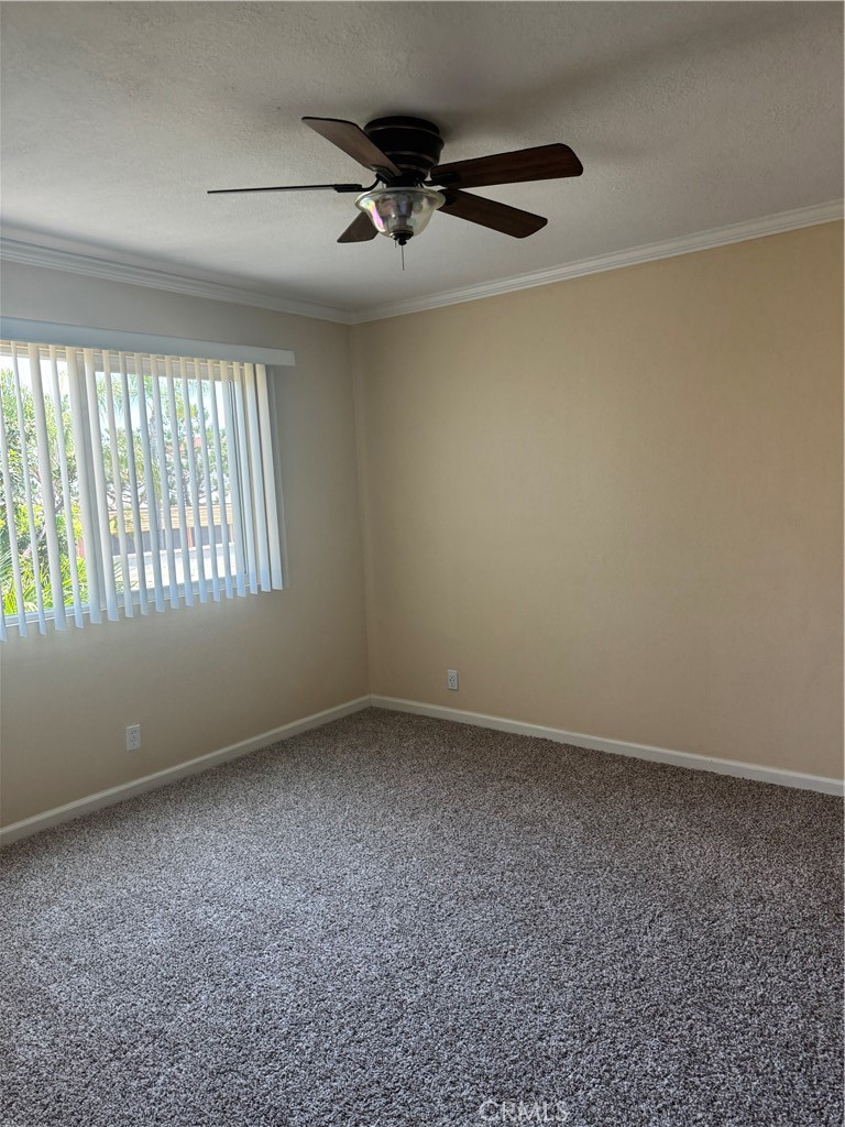 7667 Stage Road, Unit 90 La Mirada, CA 90621 - Photo 5 of 11 a view of an empty room with a window