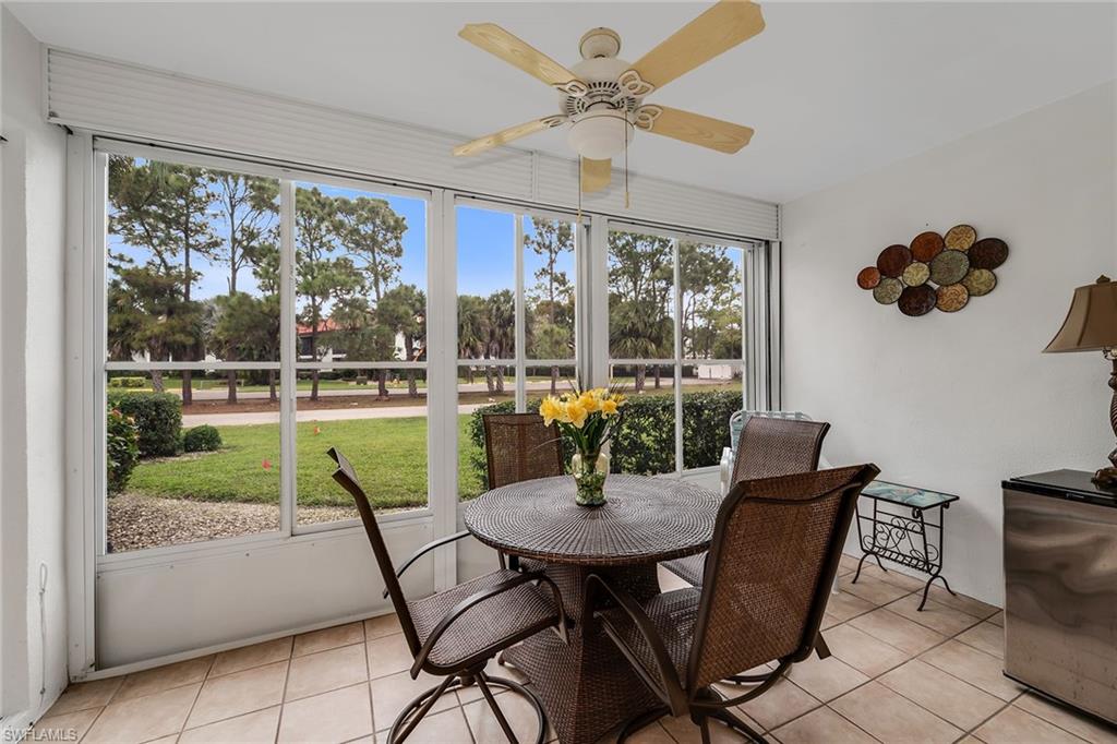 200 Valley Stream Drive, Unit 3B Naples, FL 34113 - Photo 2 of 45 a view of a dining room with furniture window and outside view