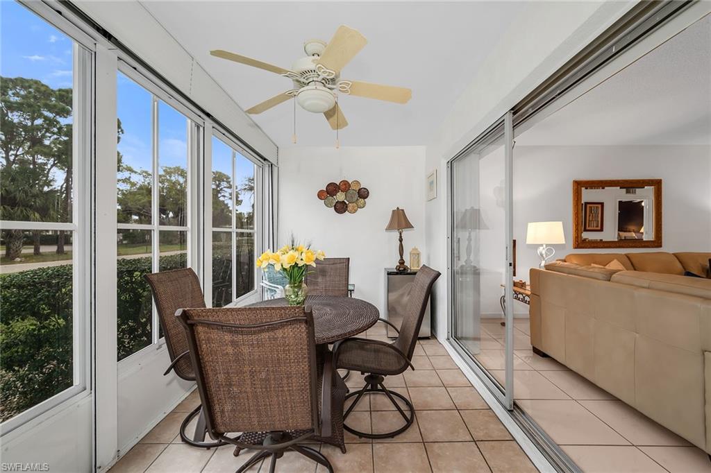 200 Valley Stream Drive, Unit 3B Naples, FL 34113 - Photo 25 of 45 a view of a workspace with furniture and a window
