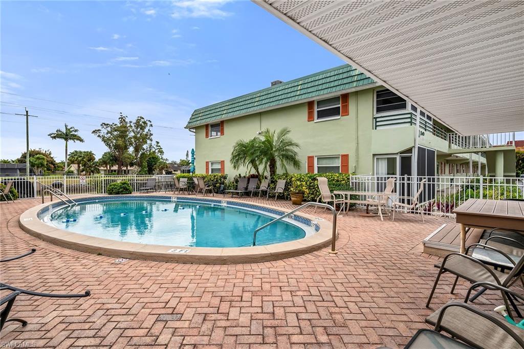 200 Valley Stream Drive, Unit 3B Naples, FL 34113 - Photo 37 of 45 a view of a swimming pool with a patio