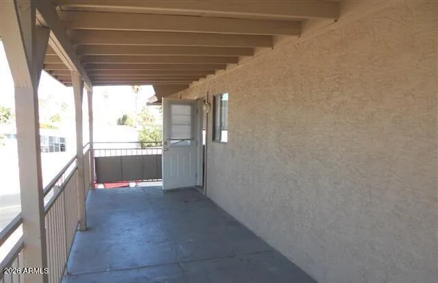 a view of entryway with a bathtub