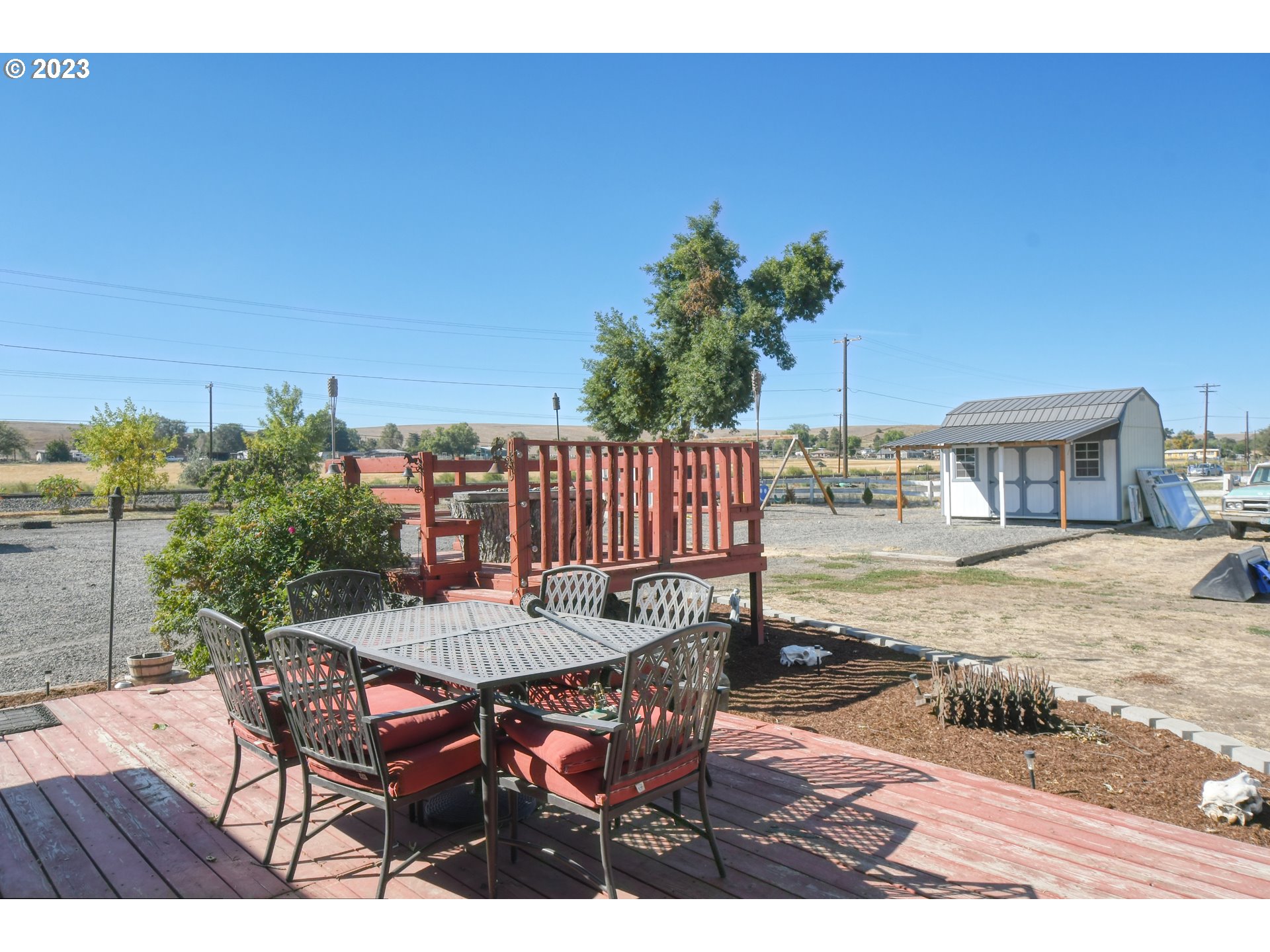 73559 Hart Lane Pendleton, OR 97801 - Photo 8 of 47 a view of a dinning tables and chairs in the patio