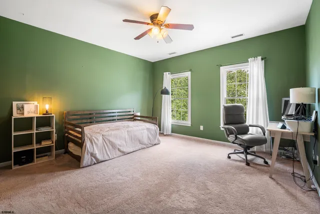 a utility room with sink dryer and washer