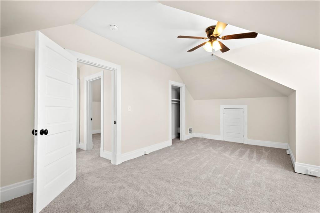1015 Greentree Road Pittsburgh, PA 15220 - Photo 17 of 25 One of the Two Children's/Guest Bedrooms on the Third Floor. Spacious with Neutral Carpet and a Ceiling Fan for Added Comfort