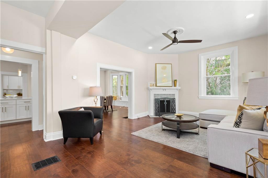 1015 Greentree Road Pittsburgh, PA 15220 - Photo 5 of 25 Living Room w/Wide Plank Hardwood Flooring, Decorative Fireplace and 10' Ceilings