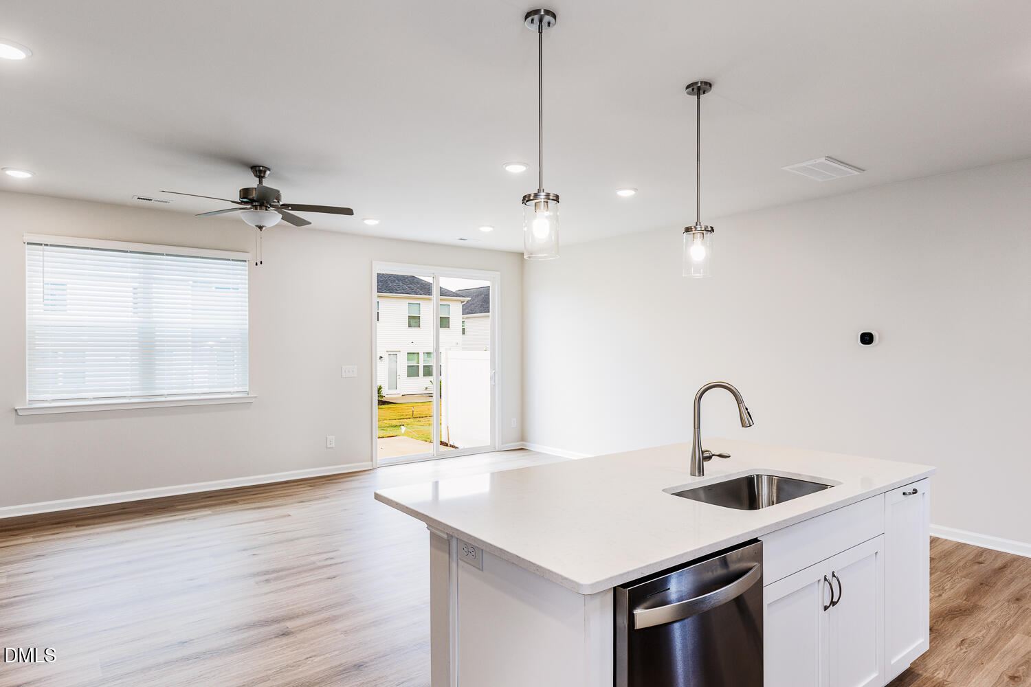 111 Siebold Street Garner, NC 27529 - Photo 12 of 35 a kitchen with a sink a counter space and windows