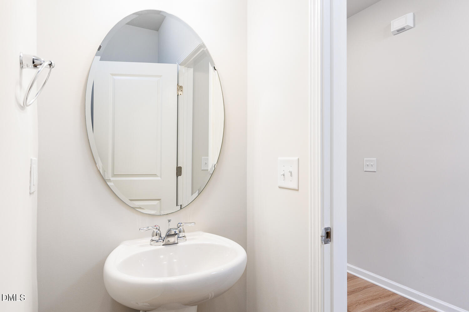111 Siebold Street Garner, NC 27529 - Photo 18 of 35 a bathroom with a sink and a mirror