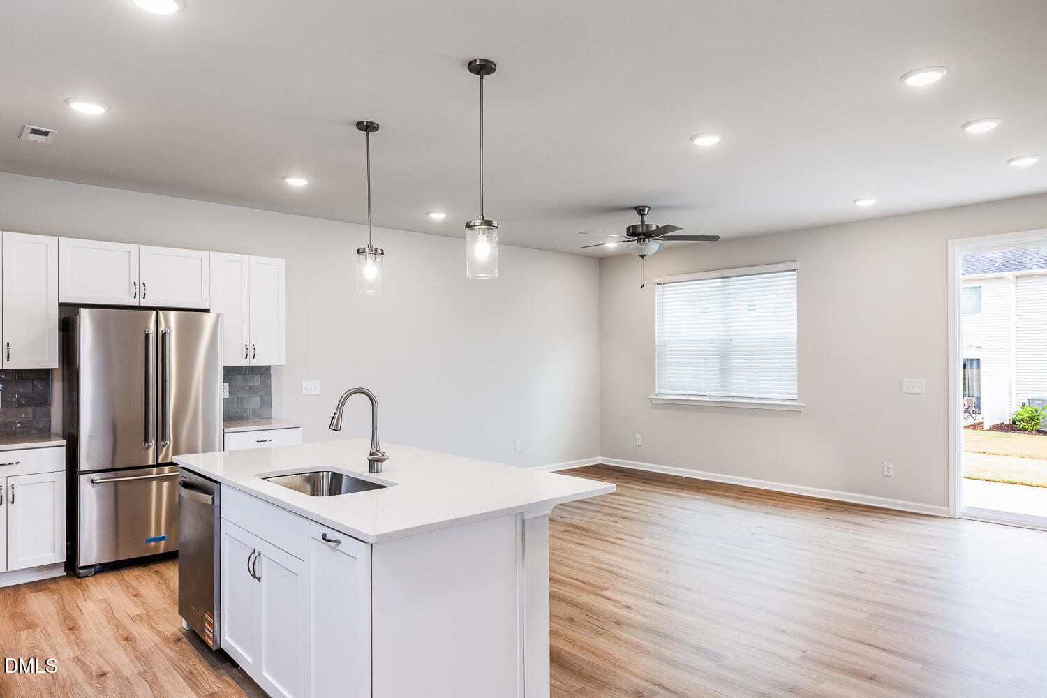 111 Siebold Street Garner, NC 27529 - Photo 7 of 35 a kitchen with a refrigerator sink and cabinets