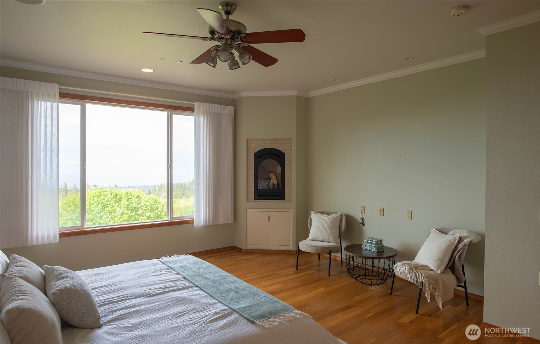 975 Simmons Road Port Angeles, WA 98362 - Photo 15 of 40 a bedroom with a bed and a window