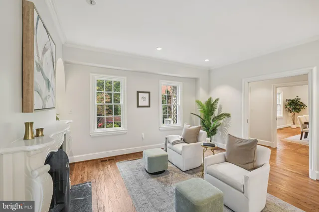 a kitchen with stainless steel appliances granite countertop a stove refrigerator and sink