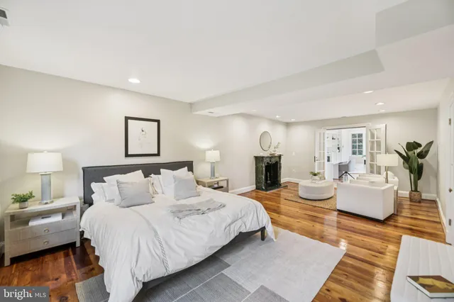 a living room with furniture and windows