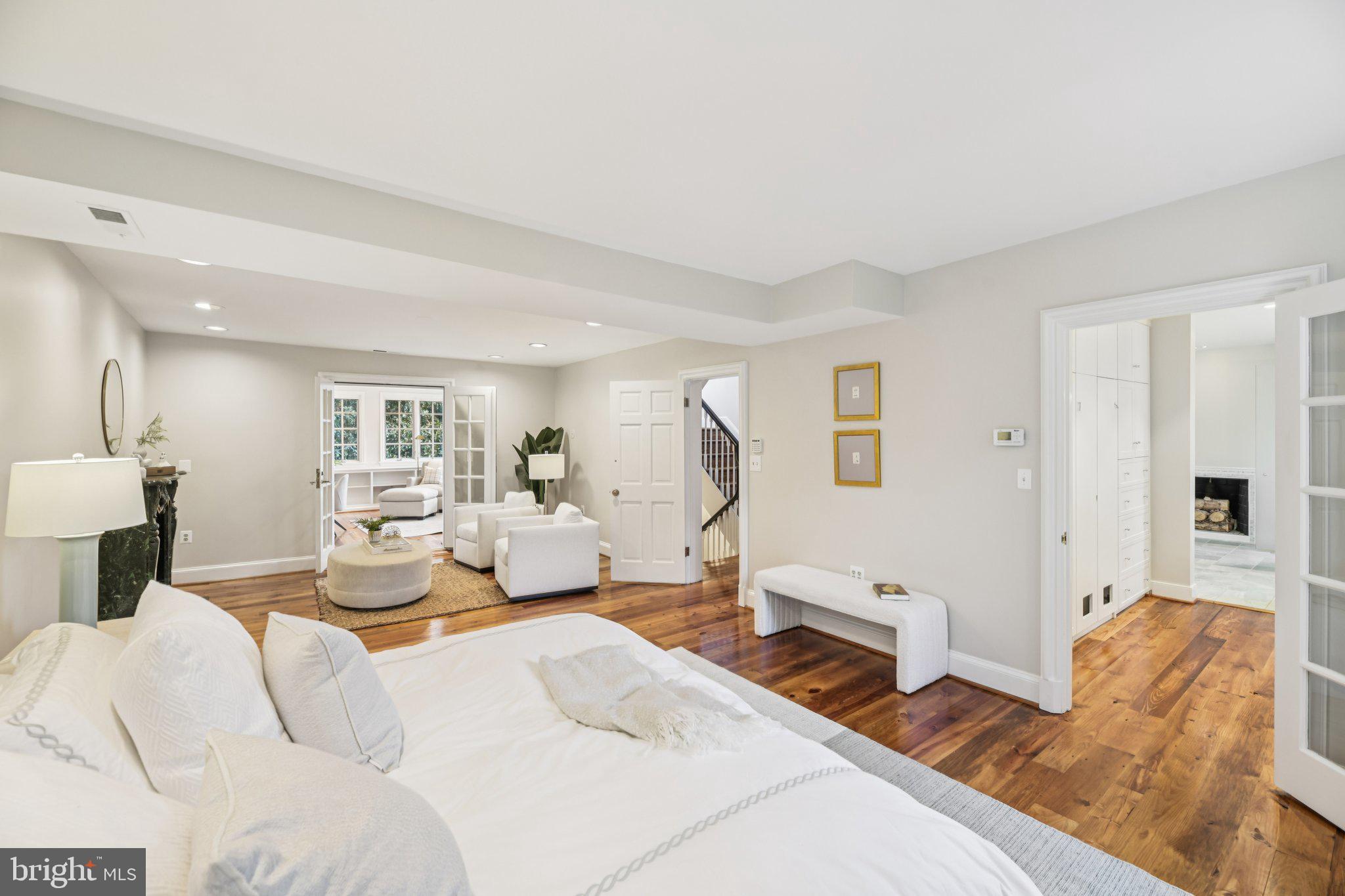 1545 35th Street Northwest Washington, DC 20007 - Photo 29 of 65 a bedroom with furniture and a wooden floor