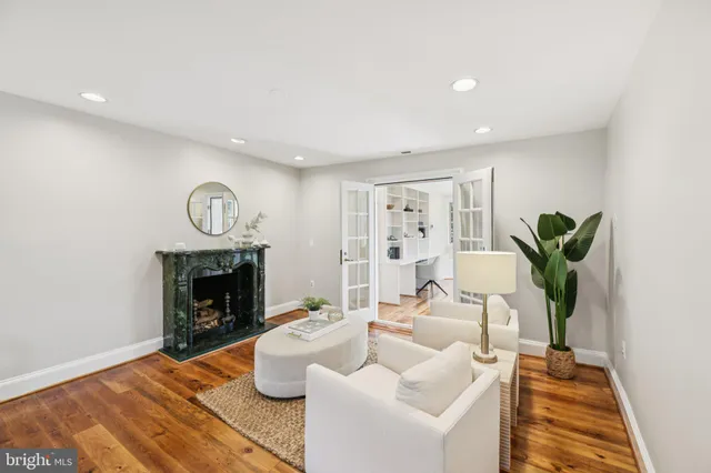 a bedroom with a bed and a fireplace