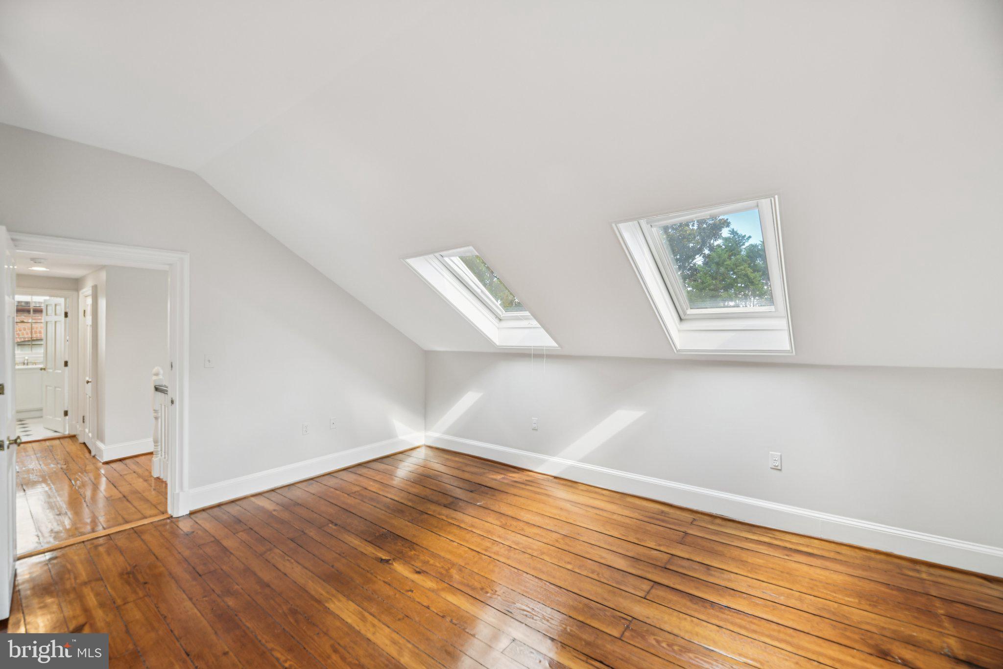 1545 35th Street Northwest Washington, DC 20007 - Photo 55 of 65 a view of empty room with wooden floor