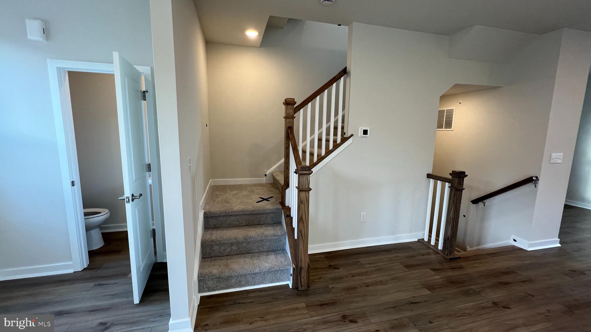 839 Pecan Road Spring City, PA 19475 - Photo 5 of 25 a view of entryway with wooden floor and stairs