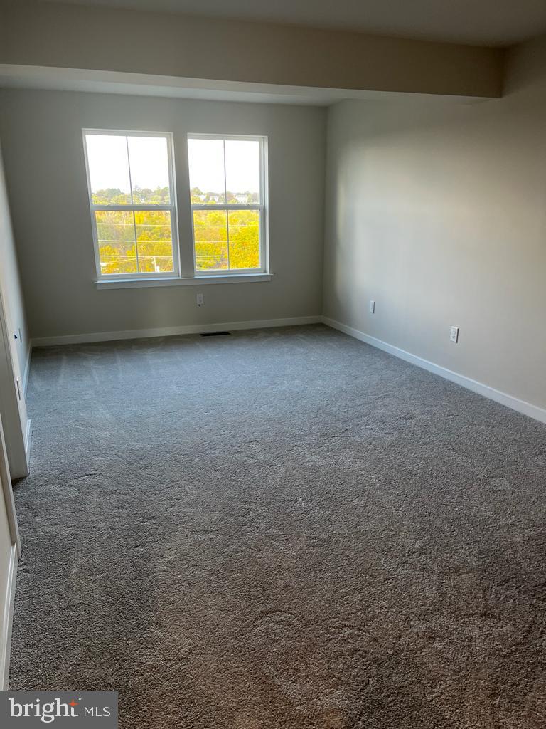 839 Pecan Road Spring City, PA 19475 - Photo 8 of 25 a view of an empty room with a window