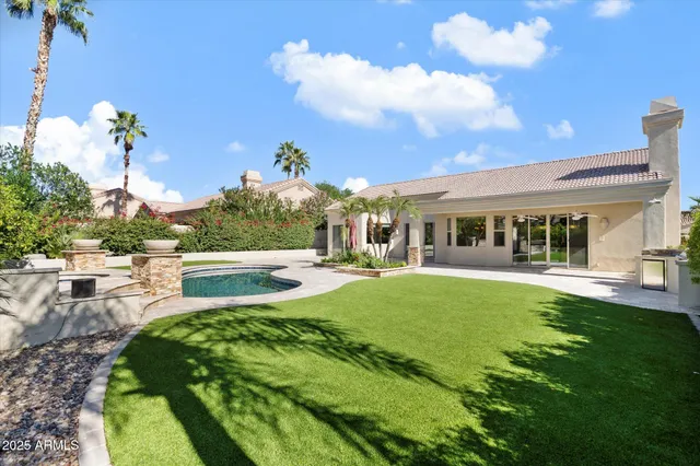 a view of a house with entertaining space