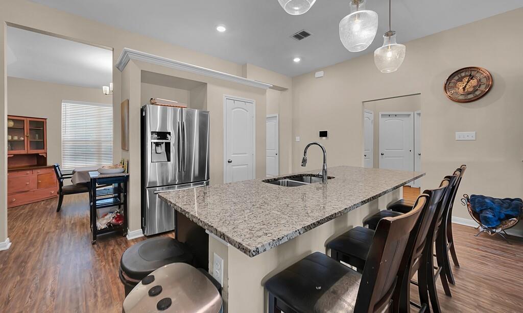 4101 King Ranch Road Waco, TX 76705 - Photo 13 of 32 a kitchen with a table and chairs in it