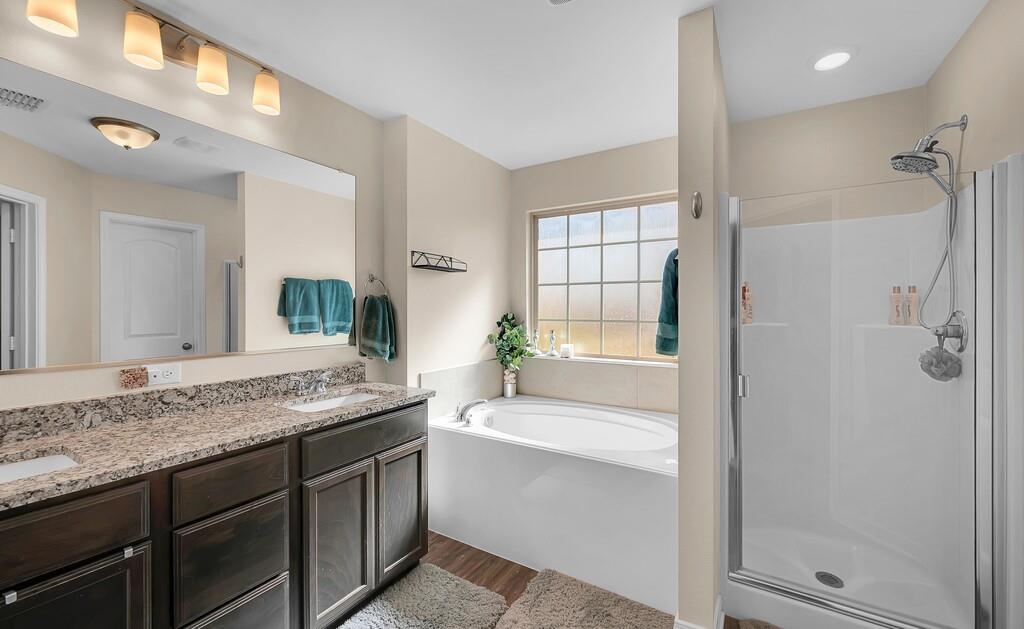 4101 King Ranch Road Waco, TX 76705 - Photo 18 of 32 a bathroom with a granite countertop sink and a mirror