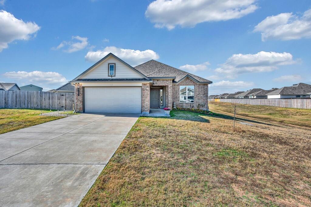 4101 King Ranch Road Waco, TX 76705 - Photo 3 of 32 a view of a house with a yard and large tree