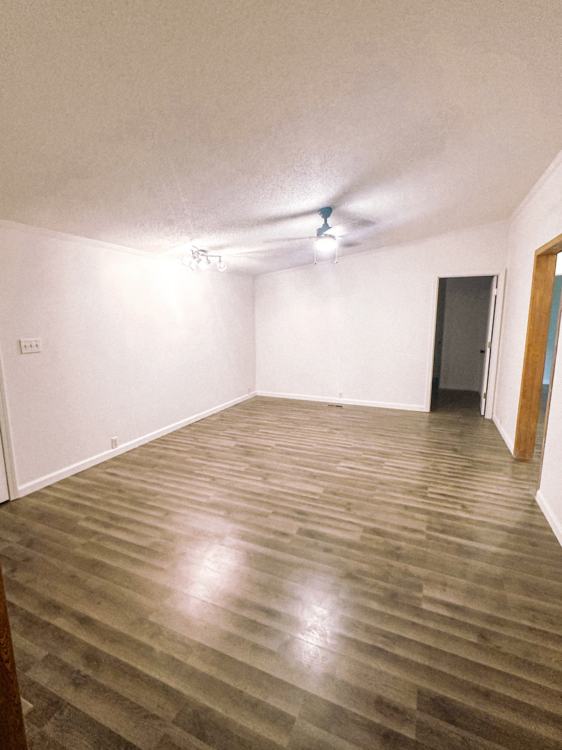 4920 Mt Moriah Road Galatia, IL 62935 - Photo 14 of 33 a view of an empty room with wooden floor