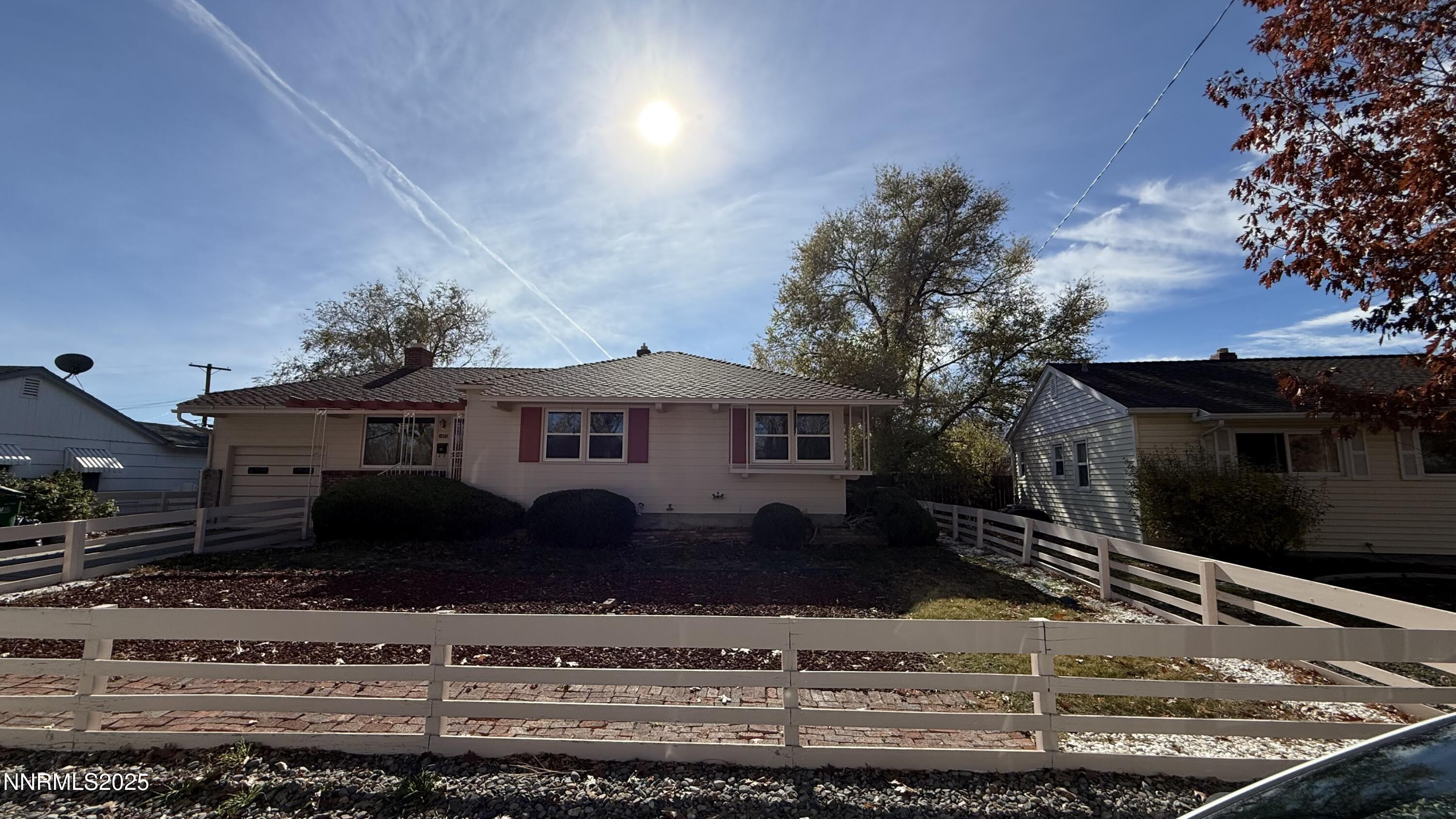1455 Wesley Drive Reno, NV 89503 - Photo 1 of 27 a front view of a house with yard