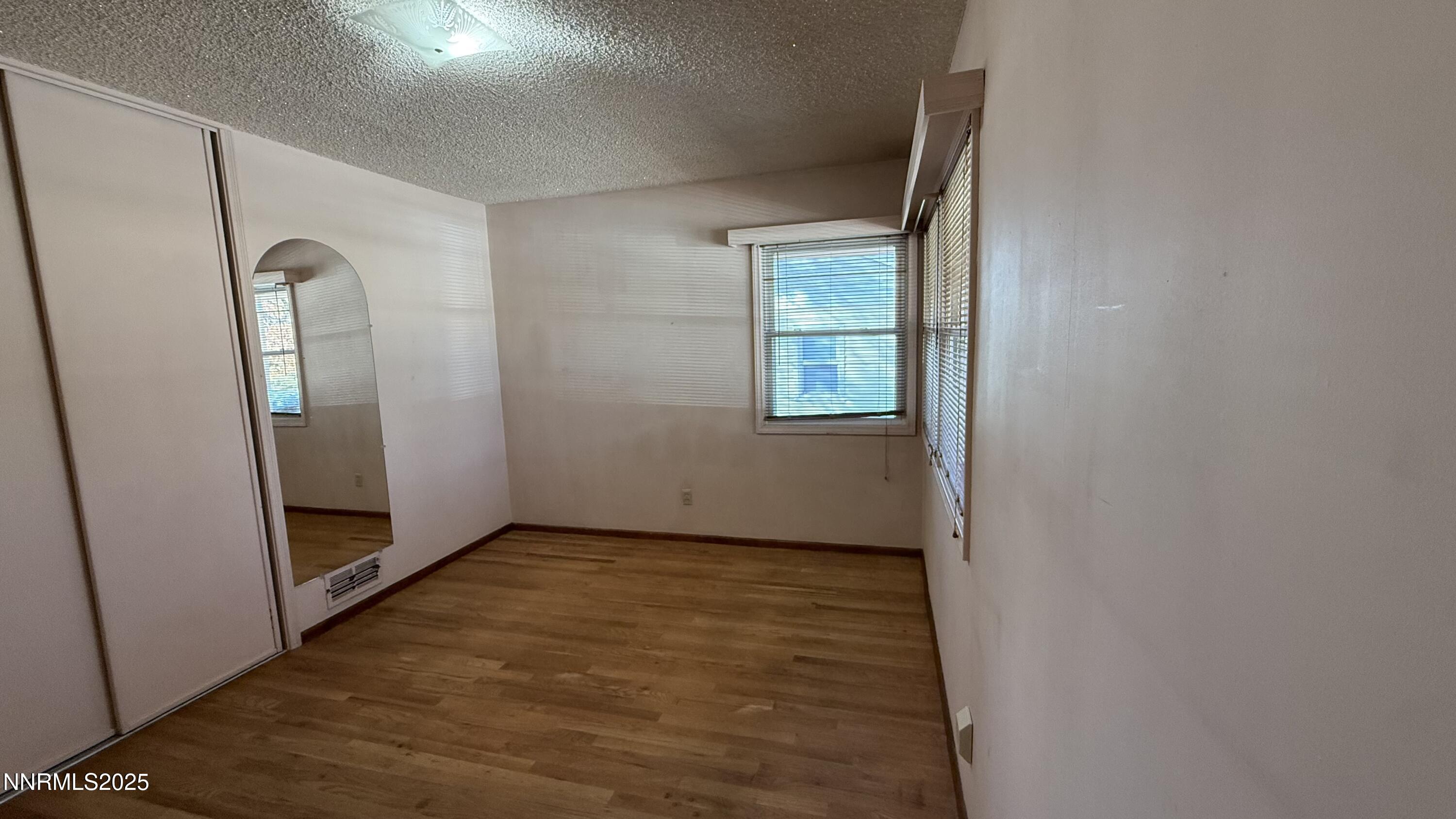 1455 Wesley Drive Reno, NV 89503 - Photo 15 of 27 an empty room with windows