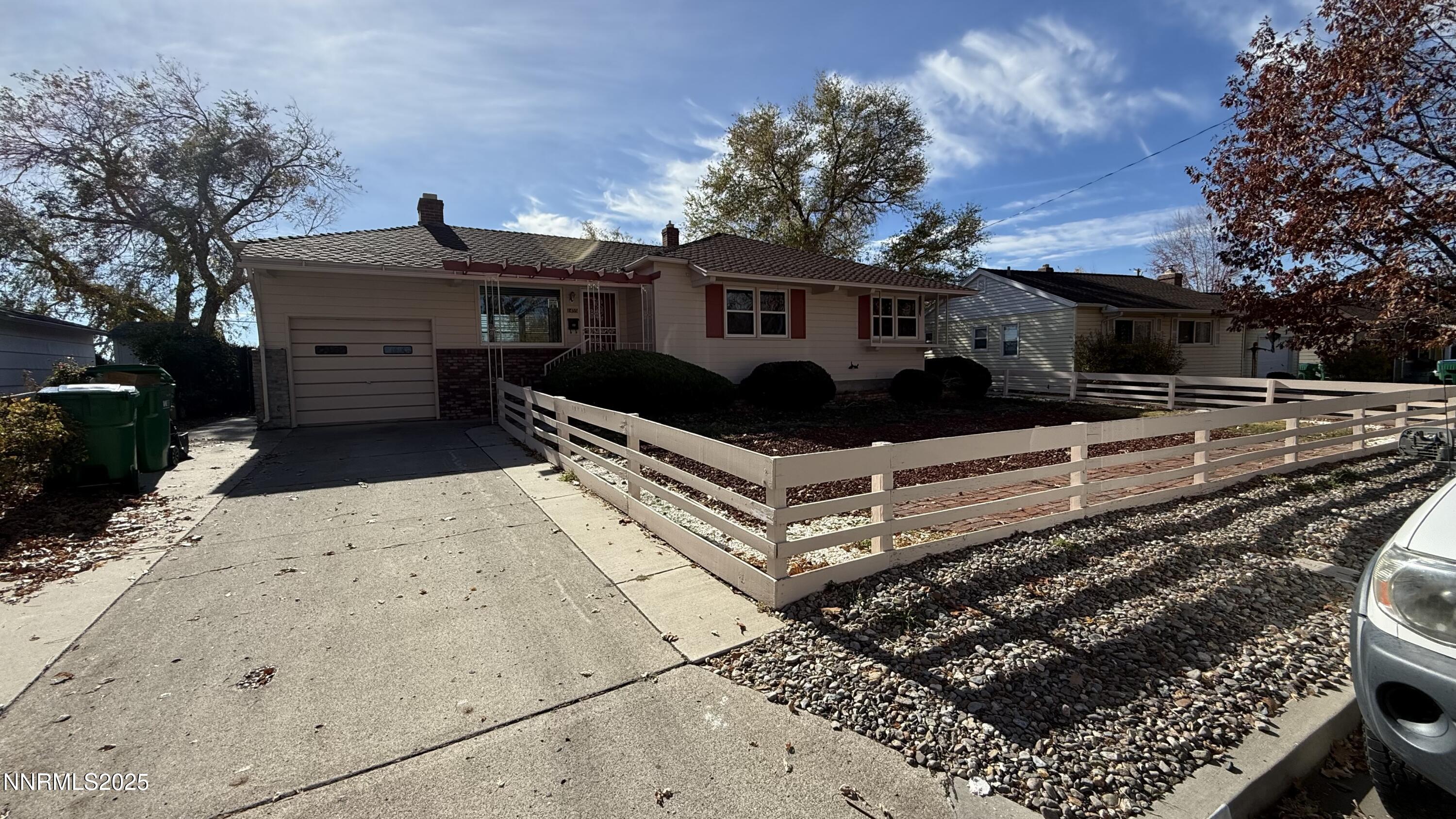 1455 Wesley Drive Reno, NV 89503 - Photo 2 of 27 a front view of a house with a yard