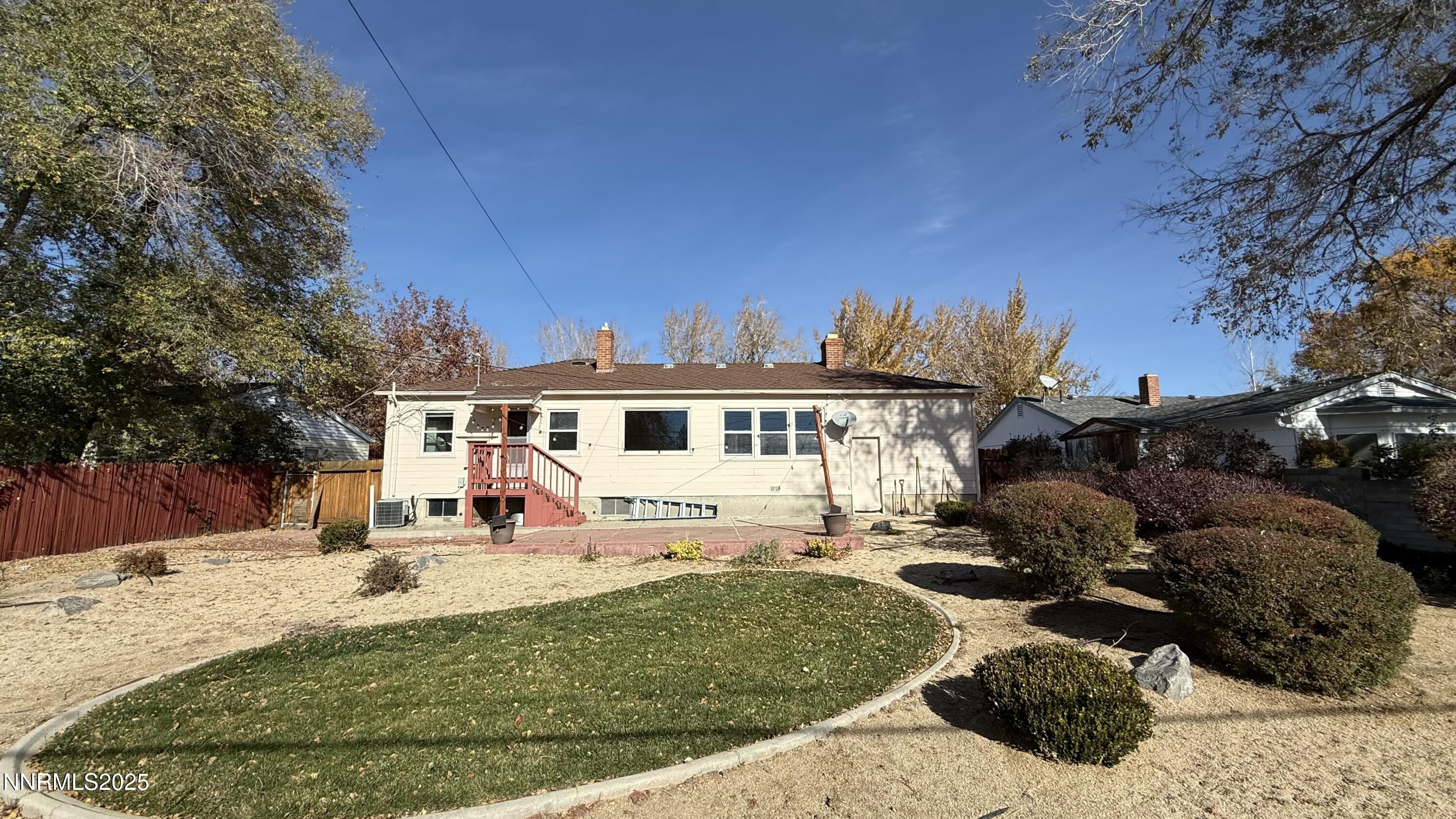 1455 Wesley Drive Reno, NV 89503 - Photo 27 of 27 a front view of a house with a yard