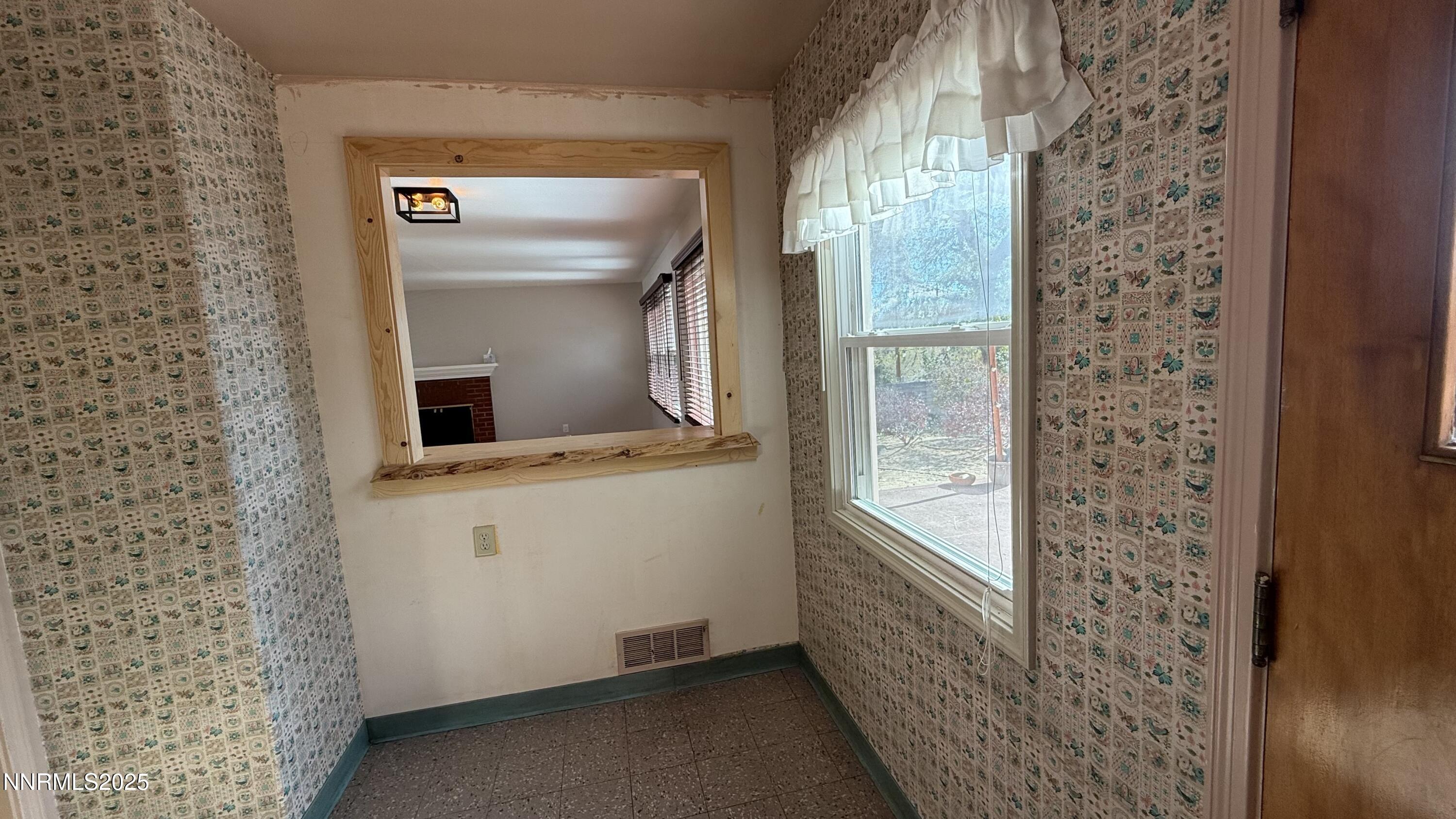 1455 Wesley Drive Reno, NV 89503 - Photo 8 of 27 a bathroom with a sink and mirror