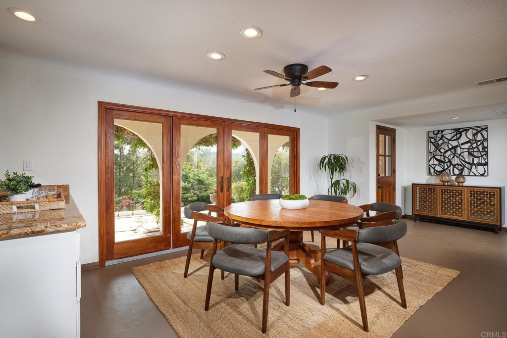 3182 Lone Jack Road Encinitas, CA 92024 - Photo 16 of 37 a dining room with furniture and window