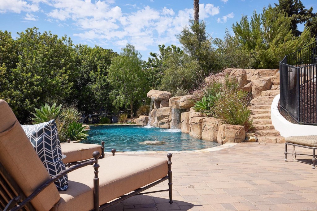 3182 Lone Jack Road Encinitas, CA 92024 - Photo 17 of 37 a view of a backyard with sitting area