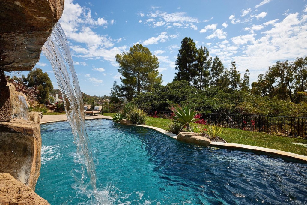 3182 Lone Jack Road Encinitas, CA 92024 - Photo 19 of 37 a view of swimming pool with a yard