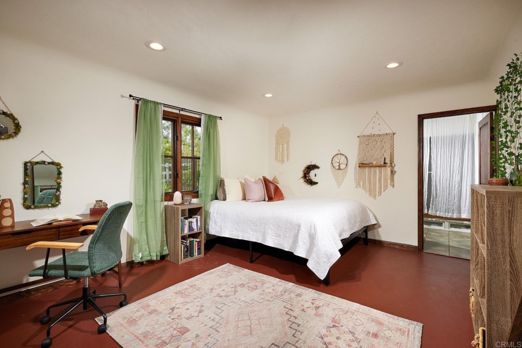 3182 Lone Jack Road Encinitas, CA 92024 - Photo 26 of 37 a bed room with a bed window and a chair
