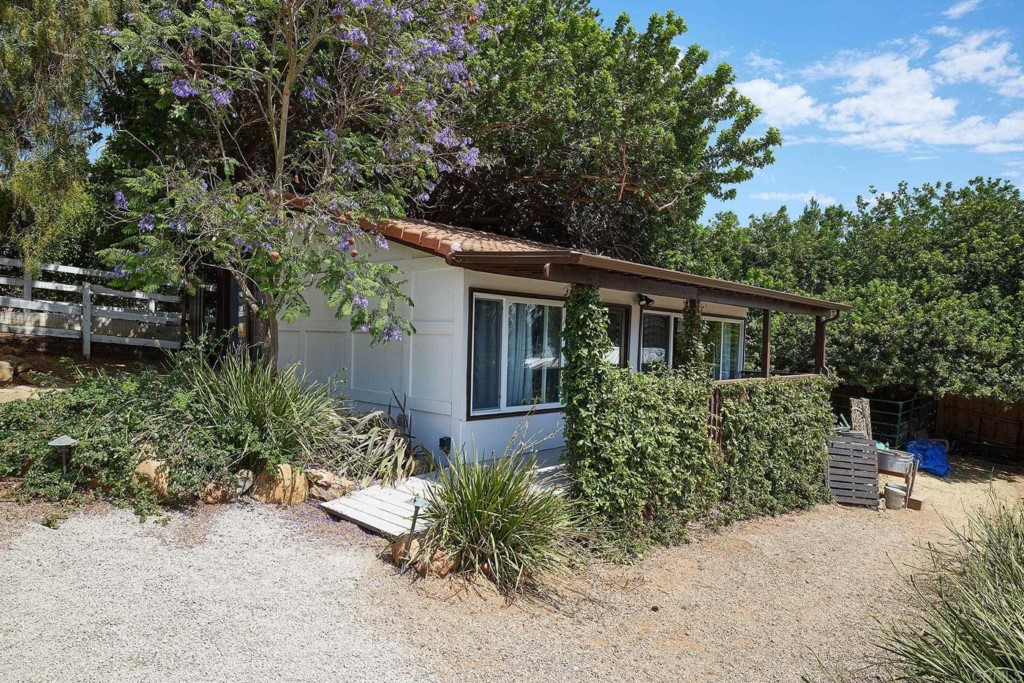 3182 Lone Jack Road Encinitas, CA 92024 - Photo 31 of 37 front view of house with a yard