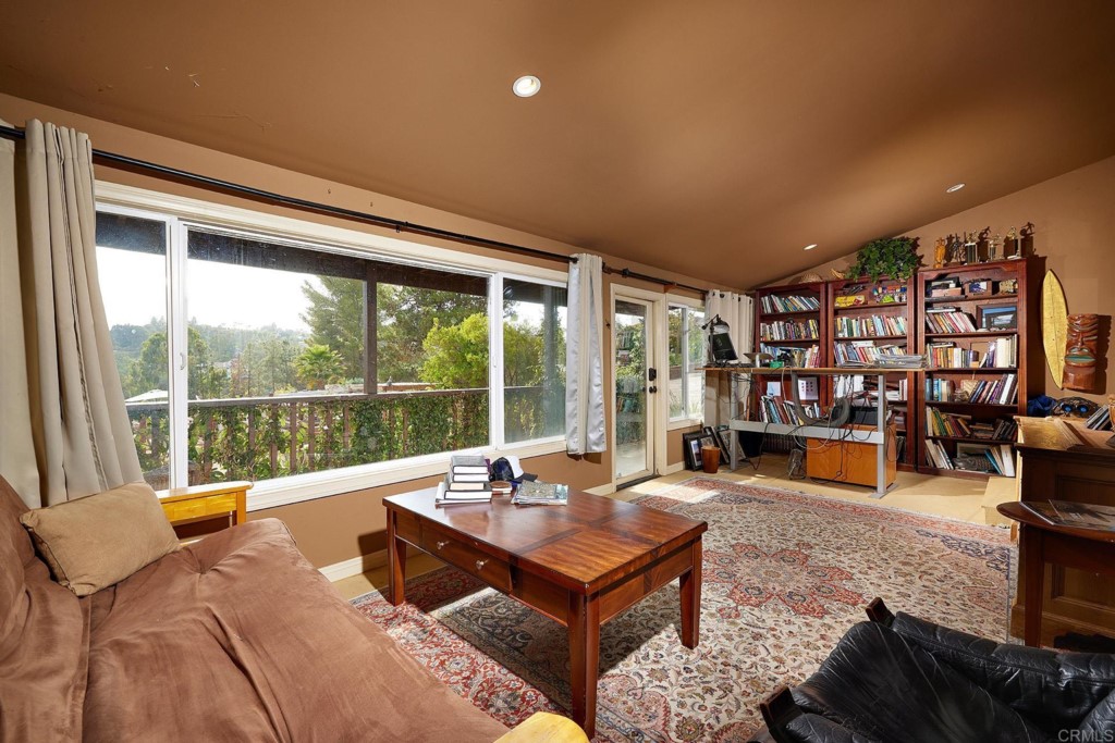 3182 Lone Jack Road Encinitas, CA 92024 - Photo 32 of 37 a living room with furniture and a large window