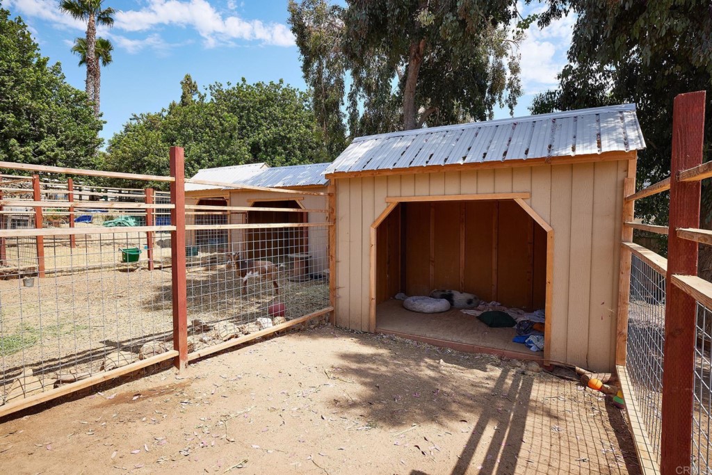 3182 Lone Jack Road Encinitas, CA 92024 - Photo 34 of 37 a view of wooden door and outdoor space