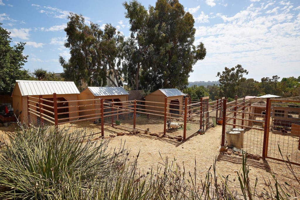 3182 Lone Jack Road Encinitas, CA 92024 - Photo 35 of 37 a view of a chairs and table on the terrace