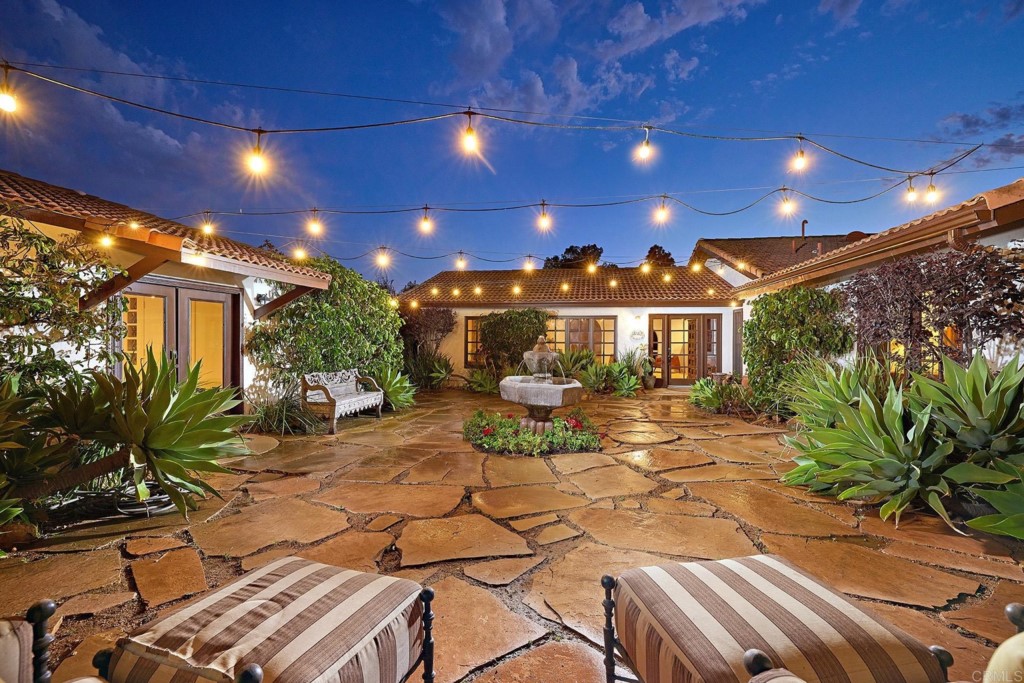 3182 Lone Jack Road Encinitas, CA 92024 - Photo 7 of 37 a view of a patio with table and chairs and potted plants