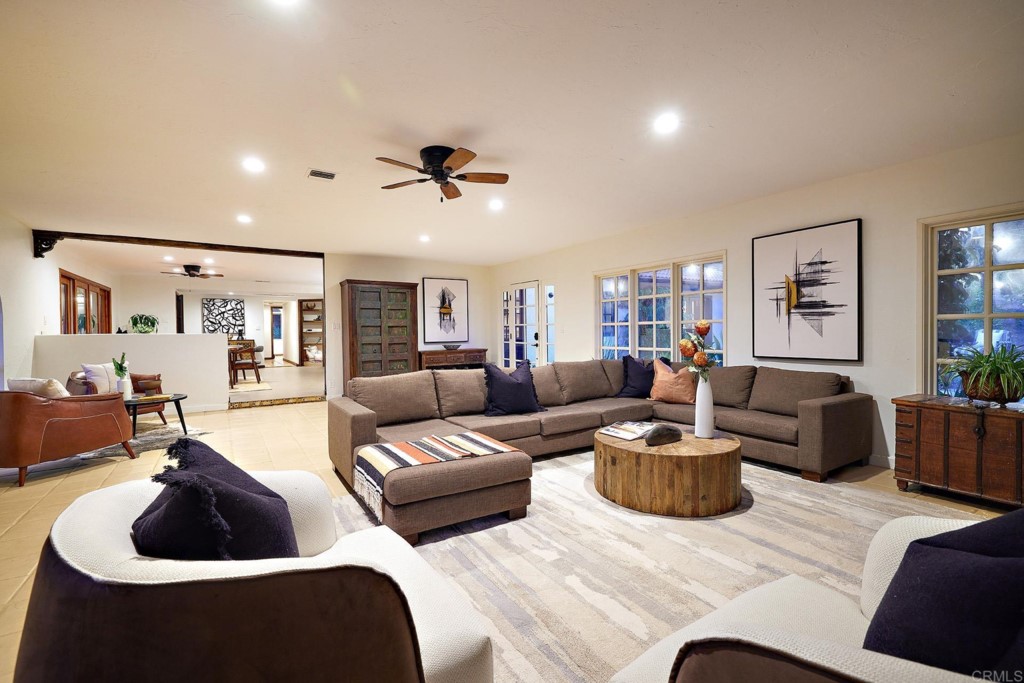 3182 Lone Jack Road Encinitas, CA 92024 - Photo 10 of 37 a living room with furniture and a wooden floor