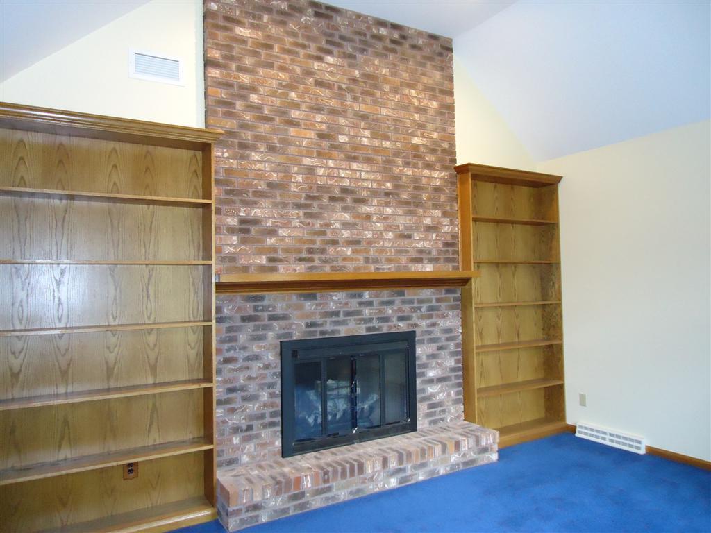 16 Prospect Hill Road Stockbridge, MA 01262 - Photo 15 of 25 a living room with a fireplace