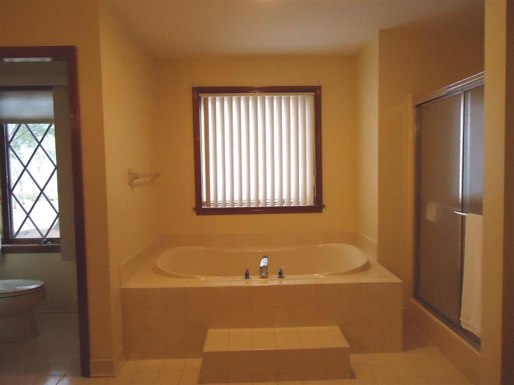 16 Prospect Hill Road Stockbridge, MA 01262 - Photo 19 of 25 a bathroom with a bathtub and a shower