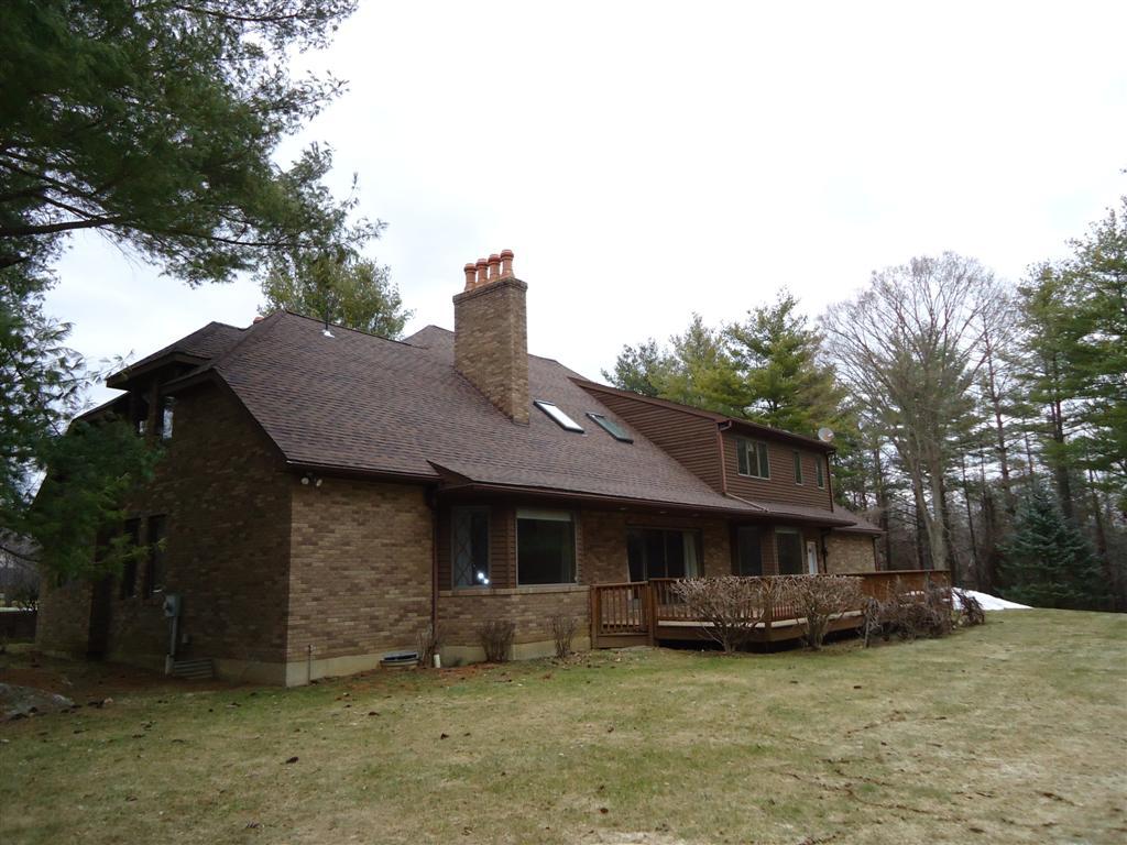 16 Prospect Hill Road Stockbridge, MA 01262 - Photo 3 of 25 a view of a house with a yard and sitting area