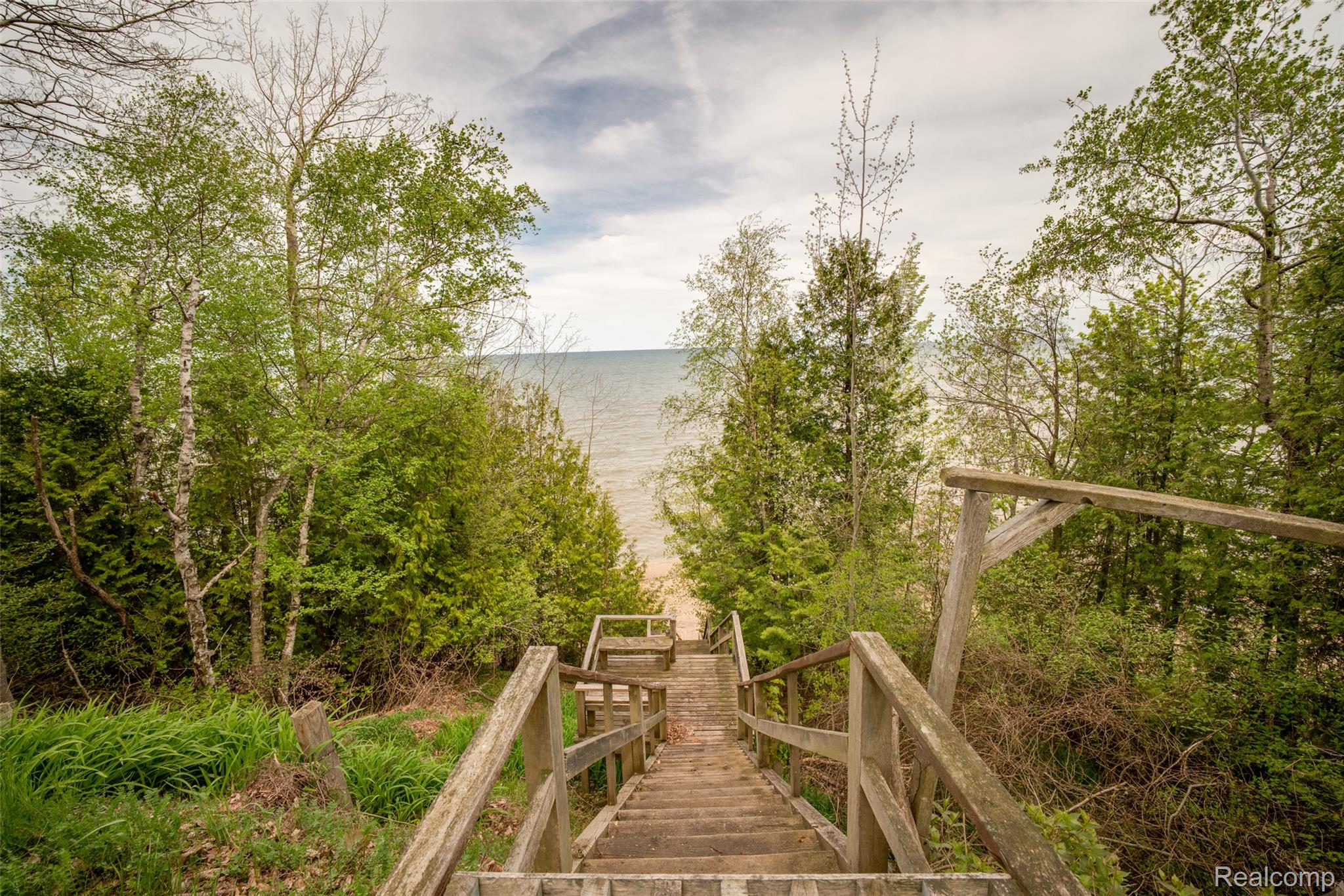6240 Lakeshore Road Palms, MI 48465 - Photo 36 of 38 View of community featuring view of water and beach