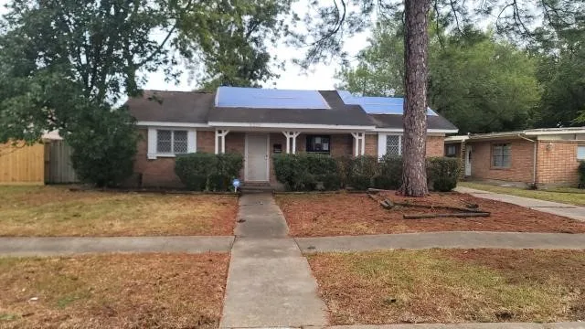 front view of a house and a yard