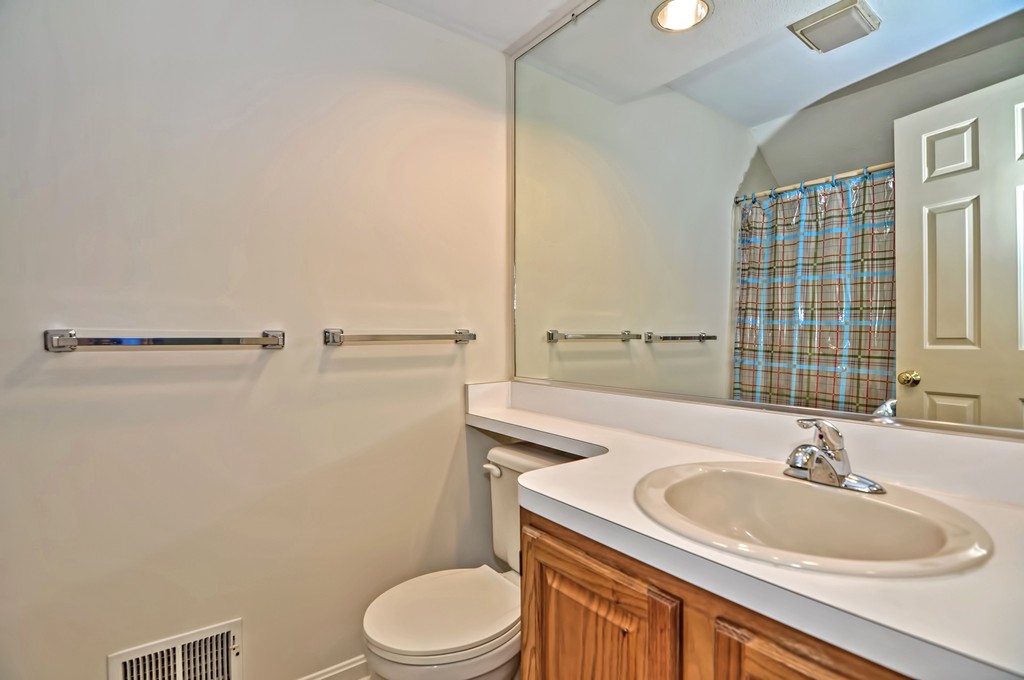 125 Stone Ridge Road, Unit 125 Franklin, MA 02038 - Photo 19 of 24 a bathroom with a sink toilet and shower